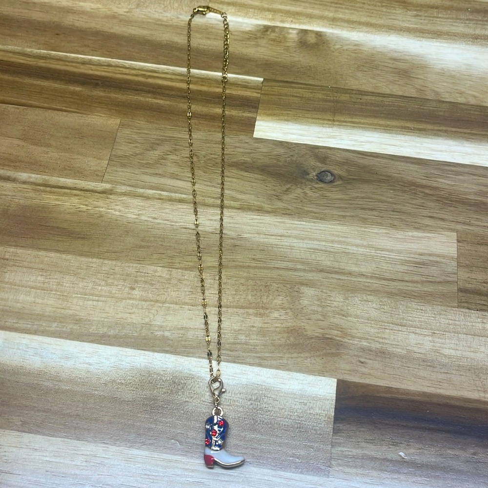 gold necklace with cowboy boots clasped charm